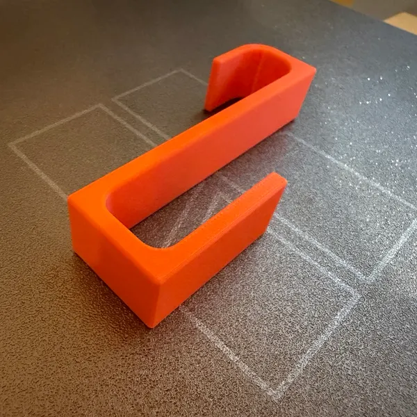 Ganxo per a tovalloles imprès en 3D, en taronja