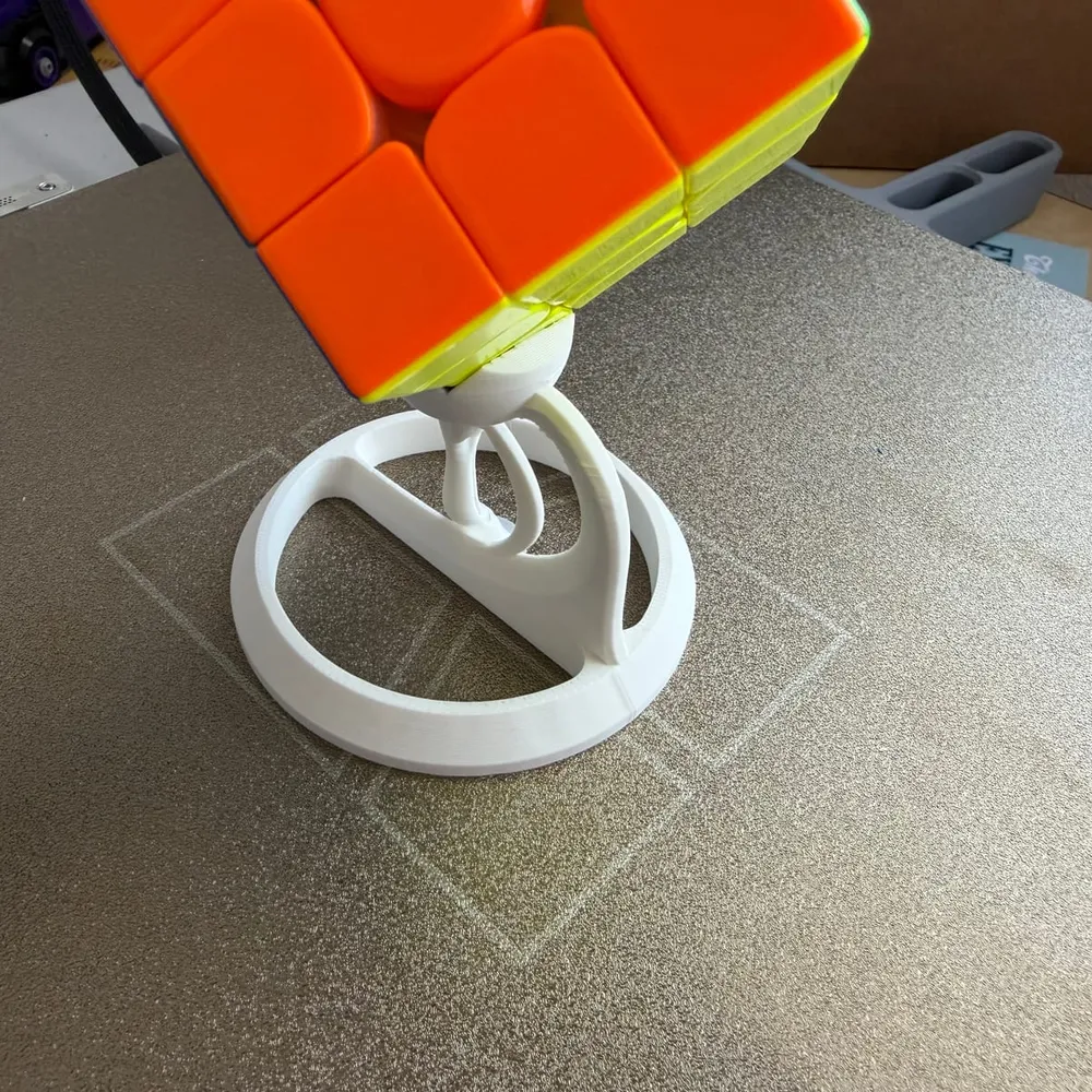 Suport giratori imprès en 3D per a cub de Rubik